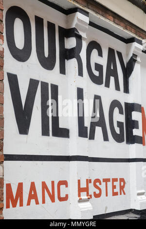 Our Gay village Manchester, painted on a wall Stock Photo