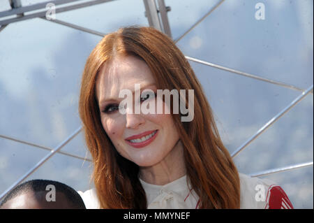 NEW YORK, NY - JUNE 01: Actress Julianne Moore lights The Empire State Building to honor Nation Gun Violence week at The Empire State Building on June 1, 2017 in New York City.  People:  Julianne Moore Stock Photo