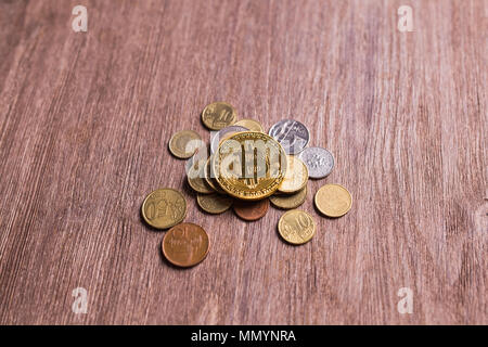 Bitcoin on coins of different countries . Digital payment system. Digital coin crypto money on bitcoin farm in digital cyberspace Stock Photo