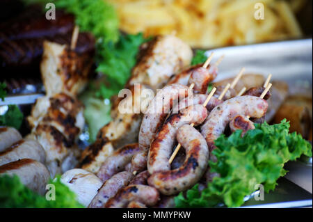 Assortment of grilled sausages . Close-up photo . Stock Photo