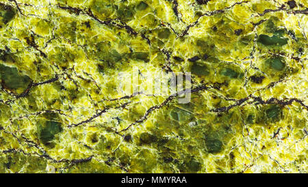 panoramic background from polished lizardite natural stone close up Stock Photo