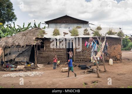 A house built by the Congolese refugee seen at the Kyangwali refugee settlement. UNHCR encourages the refugees to be self dependent by offering small plot of land for them to build their own house and farming. According to the UNHCR over 85,000 people have reached  Uganda from the Democratic Republic of Congo since the beginning of 2018 as they escape violence in the Ituri province in north eastern part of their war torned country. The majority of refugees are arriving by boat across Lake Albert, which lies between the two countries. With refugee settlements in Uganda almost at maximum capacit Stock Photo