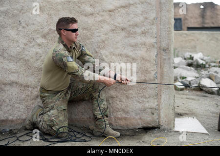 Raven’s Challenge is a U.S. Army funded explosive ordnance disposal exercise led by the Department of Justice Bureau of Alcohol, Tobacco, Firearms and Explosives to refine safe entry techniques. The archival image documents a remote door opening procedure using a rope system during the exercise at Camp Pendleton, California, on August 2, 2017. Stock Photo