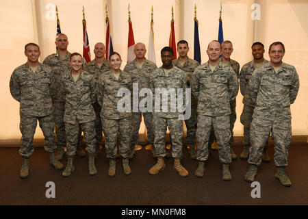 The Joint Space Operations Center’s Echo Crew poses for a photo, Aug. 3, 2017, Vandenberg Air Force Base, Calif. The JSpOC Echo Crew was recently recognized as the 2017 Air Force Association’s Best Space Operations Crew, July 27. The award is presented to the best overall space operations crew in the Air Force. (U.S. Air Force photo by Senior Airman Robert J. Volio/Released) Stock Photo