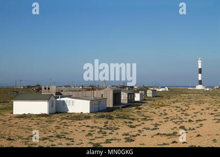 Buildings and light house on Romney Marsh, Dungeness in Kent. Stock Photo