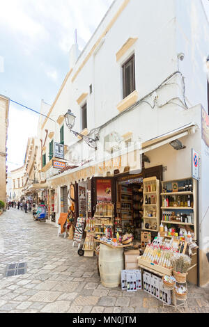 Gallipoli, Apulia, Italy - MAY 2017 - Traditional souvenir shops in the pedestrian zone of Gallipoli Stock Photo