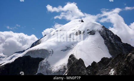 panorama view of a mountain landscape in the Swiss Alps near Pontresina with Piz Morteratsch in the foreground Stock Photo