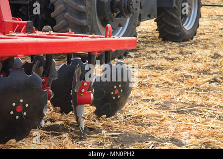 Agricultural disc harrow, close-up on the ground, farm equipment Stock Photo