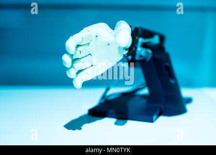 plastic robot hand with open palm gesture Stock Photo