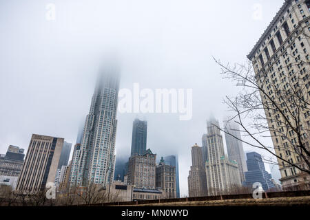 New York, US - March 29, 2018: Downtown Manhattan with buildings obsucured under heavy fog Stock Photo