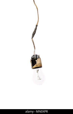 Retro incandescent lamp with damaged wires. Isolated on white background, move for create copy space. Concept - neglect of fire safety. Stock Photo