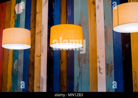 lamp Circle Orange.Suspended ceiling lamp.modern, retro pendant light with vintage light bulb. Stock Photo