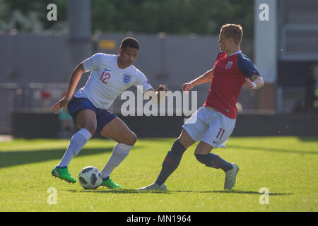 Burton, UK. 13th May, 2018. Burton, UK. 13th May, 2018. Vontae Daley-Campbell (England) takes on Kornelius Normann Hansen (Norway) during the 2018 UEFA European Under-17 Championship Quarter Final match between England and Norway at Pirelli Stadium on May 13th 2018 in Burton upon Trent, England. (Photo by Richard Burley/phcimages.com) Credit: PHC Images/Alamy Live News Credit: PHC Images/Alamy Live News Stock Photo