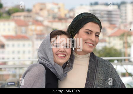 Cannes, France. 13th May, 2018. CANNES, FRANCE - MAY 13: (L-R) Actresses Marzieh Rezaei and Behnaz Jafari attend the photocall for the '3 Faces (Se Rokh)' during the 71st annual Cannes Film Festival at Palais des Festivals on May 13, 2018 in Cannes, France. Credit: Frederick Injimbert/ZUMA Wire/Alamy Live News Stock Photo