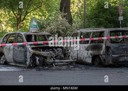 14 May 2018, Germany, Berlin: Burnt-out cars at Kollwitzplatz in the district of Prenzlauer Berg. In the early morning eleven cars burned down. Cars parked at the neighbouring Knaackstrasse were also ignited. Since a political motivate is assumed, the State Protection Office is in charge of the investigation. Photo: Paul Zinken/dpa Stock Photo