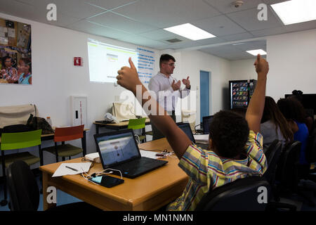 Maker Space Lab is an educational program focused on teaching digital technology skills to students. The archival image documents a participant at the Shadow Mountain Branch Library at Marine Corps Air Ground Combat Center Twentynine Palms, California, during a technology learning session designed for children of military families. Stock Photo