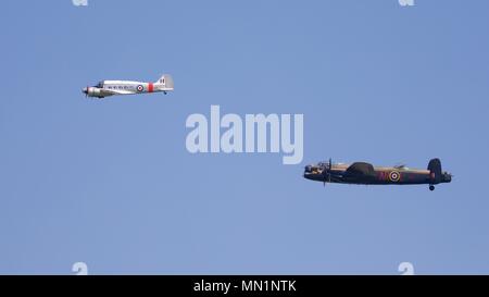 Avro C19 Anson and the BBMF Avro Lancaster performing a rare flypast together at Shuttleworth Season premiere airshow in 2018 Stock Photo