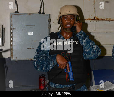 MAYPORT, Fla. (August 8, 2017) Master-at-Arms 1st Class Justin Tanner contacts the anti-terrorism officer on the quarter deck of the amphibious assault ship USS Iwo Jima (LHD 7) during an anti-terrorism force protection drill. Iwo Jima is in port conducting a scheduled continuous maintenance availability in preparation for their upcoming deployment. (U.S. Navy photo by Mass Communication Specialist Seaman Dary M. Patten/Released) Stock Photo