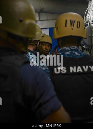 MAYPORT, Fla. (August 8, 2017) Sailors approach the ship store of the amphibious assault ship USS Iwo Jima (LHD 7) during an anti-terrorism force protection drill. Iwo Jima is in port conducting a scheduled continuous maintenance availability in preparation for their upcoming deployment. (U.S. Navy photo by Mass Communication Specialist Seaman Dary M. Patten/Released) Stock Photo