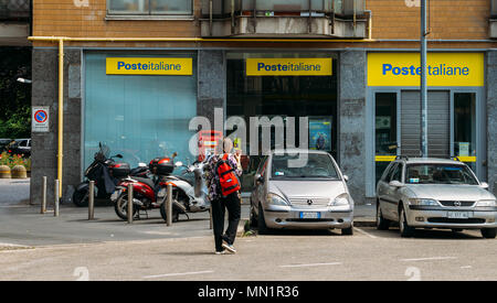 Poste Italiane branch. Besides providing core postal services, Poste Italiane SpA offers integrated products such as postal savings, logistics and financial services Stock Photo