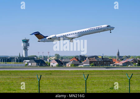 Bombardier CRJ-900LR, regional jet airliner from Lufthansa CityLine taking off from runway at Brussels Airport, Zaventem, Belgium Stock Photo