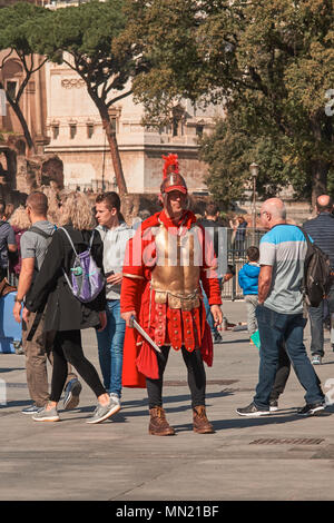 Italy, Rome, March 14 / 2018 Roman centurion with tourists Stock Photo