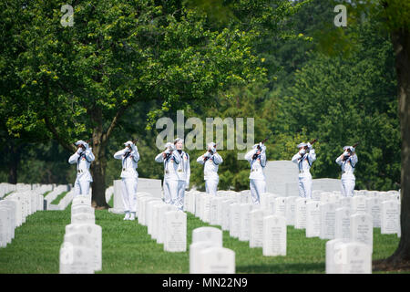The U.S. Navy Ceremonial Guard participates in the graveside service for U.S. Navy Fire Controlman Chief Gary Leo Rehm Jr. at Arlington National Cemetery, Arlington, Va, Aug. 14, 2017.  Rehm perished when the USS Fitzgerald (DDG 62) was involved in a collision with the Philippine-flagged merchant vessel ACX Crystal on June 17, 2017.  U.S. Navy  posthumously promoted Rehm to Fire Controlman Chief in a ceremony earlier this week. (U.S. Army photo by Elizabeth Fraser / Arlington National Cemetery / released) Stock Photo