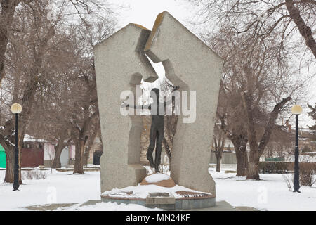 Evpatoria, Crimea, Russia - February 28, 2018: Monument to the victims of Chernobyl in the Komsomol park of Evpatoria, Crimea Stock Photo