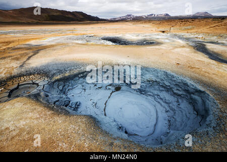 Gray mud pots, wide angle view. Namaskard, Iceland. Stock Photo