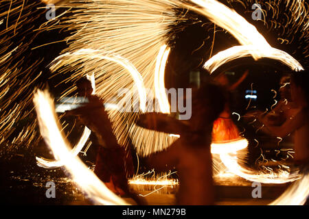 Pandeglang, Indonesia. 13th May, 2018. Dancers performance fire dance during Rhino Kites Festival Tanjung Lesung Festival 2018 at Beach Club area in Tanjung Lesung Hotel and Resort Pandeglang, Banten province, Indonesia. Rhino Kites Festival Tanjung Lesung Festival 2018 will be held on May 12 - 13 this week supported by Tanjung Lesung Hotel and Resort. Credit: Dadang Tri/Pacific Press/Alamy Live News Stock Photo