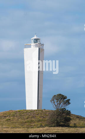 The lighthouse at Cape Jervis in South Australia, Australia safely guides ships travelling through Backstairs Passage. Stock Photo