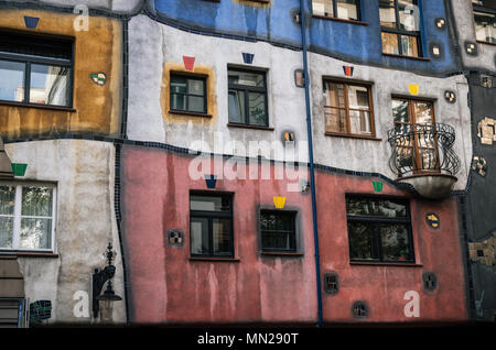 Vienna, Austria - 01 October, 2017: The view of facade of Hundertwasser house with multicolored walls in Vienna, Austria Stock Photo