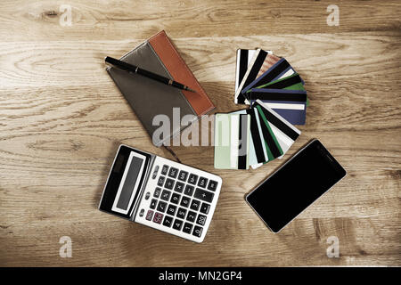 calculator,pen, Notepad and a Bank of discount  credit cards  Stock Photo