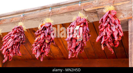 Dried Red Chili Pepper Ristra. Hanging in Old Town Albuquerque, New Mexico, USA. Stock Photo