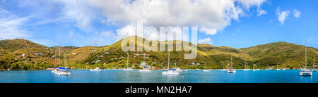 Panoramic view of a harbor with anchored sailboats in BVI Stock Photo
