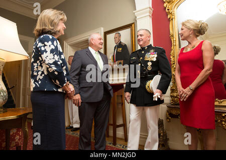 From left, Mary Ruff Perdue, wife of Sonny Perdue, 31st United States secretary of Agriculture, U.S. Marine Corps Gen. Glenn M. Walters, and his wife Gail Walters, tour the Home of the Commandants before an Evening Parade at Marine Barracks Washington, Washington, D.C., August 11, 2017. Evening parades are held as a means of honoring senior officials, distinguished citizens and supporters of the Marine Corps. (U.S. Marine Corps photo by Lance Cpl. Hailey D. Clay) Stock Photo