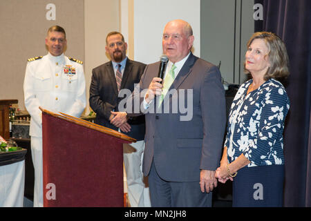 Sonny Perdue, 31st United States secretary of Agriculture, speaks during a reception before an Evening Parade as the guest of honor with his wife, Mary Ruff Perdue, at Marine Barracks Washington, Washington, D.C., August 11, 2017. Evening parades are held as a means of honoring senior officials, distinguished citizens and supporters of the Marine Corps. (U.S. Marine Corps photo by Lance Cpl. Hailey D. Clay) Stock Photo