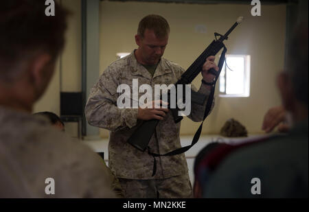 Modern assault rifles in the hands of Ukrainian army soldiers. Armed ...