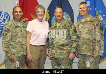 (From Left) Lt. Gen. Jeffrey L. Harrigian, U.S. Air Forces Central Command commander, Secretary of the Air Force Dr. Heather Wilson, Air Force Chief of Staff Gen. David L. Goldfein, and Brig. Gen. Andrew A. Croft, Deputy Commanding General – Air for Combined Forces Land Component Command – Operation Inherent Resolve, pose for a group photo in Baghdad, Iraq, Aug. 19, 2017. The visit was part of a battlefield circulation in Iraq to visit Airmen and observe the impact of air power at CJFLCC-OIR. (US Army Photo by Sgt. Von Marie Donato) Stock Photo