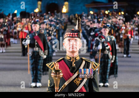 The 1st Battalion Scots Guard Pipes and Drums, along with the Royal Highland Fusilers, 2nd Battalion the Royal Regiment of Scotland await for the first salute from Marine Corps Gen. Joseph F. Dunford Jr., chairman of the Joint Chiefs of Staff, the guest of honor at The Royal Edinburgh Military Tattoo held at Edinburgh Castle, Scotland, Aug. 25, 2017. This year performers from 50 countries have taken part in the Tattoo, including the U.S. Navy Band, and the Japan Ground Self-Defense Force. (DOD photo by U.S. Navy Petty Officer 1st Class Dominique A. Pineiro) Stock Photo