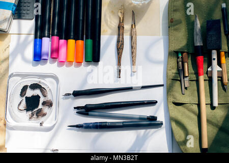 Calligraphy painter workplace Stock Photo - Alamy