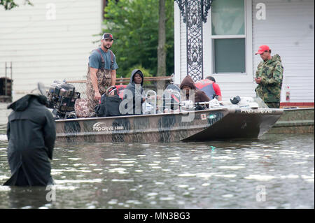 Hurricane Harvey flooding in Port Arthur, Texas, August 30, 2017. Hurricane Harvey formed in the Gulf of Mexico and made landfall in southeastern Texas, bringing record flooding and destruction to the region. U.S. military assets supported FEMA as well as state and local authorities in rescue and relief efforts. (U.S. Army National Guard photo by Sgt. 1st Class Malcolm McClendon). Stock Photo