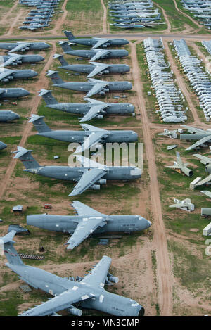 Retired C-5 Galaxies sit at the 309th Aerospace Maintenance and Regeneration Group’s Aircraft and Missile Storage and Maintenance Facility on Davis-Monthan AFB, Ariz, Aug 2, 2017. The AMARG is the largest aircraft storage and preservation facility in the world. (U.S. Force Photo by Staff Sgt. Perry Aston) Stock Photo