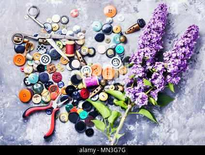 Set buttons from clothes, threads and scissors.Sewing accessories. Stock Photo