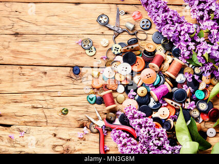 Set buttons from clothes, threads and scissors.Sewing accessories. Stock Photo