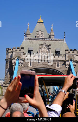 Tower Bridge seen from an open top sightseeing bus - London Stock Photo