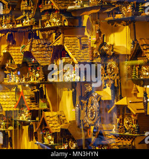 Lucerne, Switzerland - October 19, 2017: Original expensive cuckoo clocks on the shop window of the souvenir shop Stock Photo