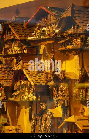 Lucerne, Switzerland - October 19, 2017: Original expensive cuckoo clocks on the shop window of the souvenir shop Stock Photo