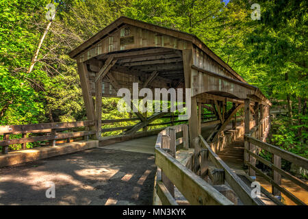 The covered bridge at Lanterman's Mill in Mill Creek Park in Youngstown Ohio. Built in 1989. Stock Photo