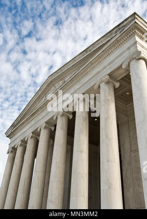 The magnificent Jefferson Memorial framed by a beautiful, cloud filled sky.  Located on the National Mall in Washington DC. Stock Photo